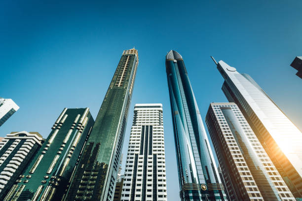 Skyscrapers in Dubai under clear blue sky, representing the destination for visa application tracking.